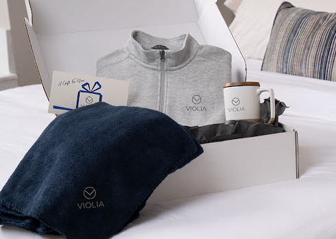 Gift box with a shirt, towel and coffee mug.