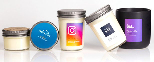 Company branded candles with logo design.